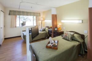 Semi private room with a large window