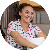 Nurse smiling inside the facility